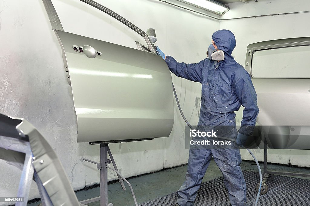 Pintura de trabajador de puerta. - Foto de stock de Abrigo libre de derechos