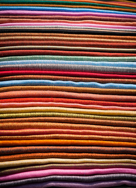 istock Colourful Cashmere Scarves in a Pile 165492984