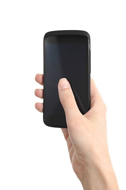 Woman hand holding and touching a mobile phone screen with her thumb on a white isolated background