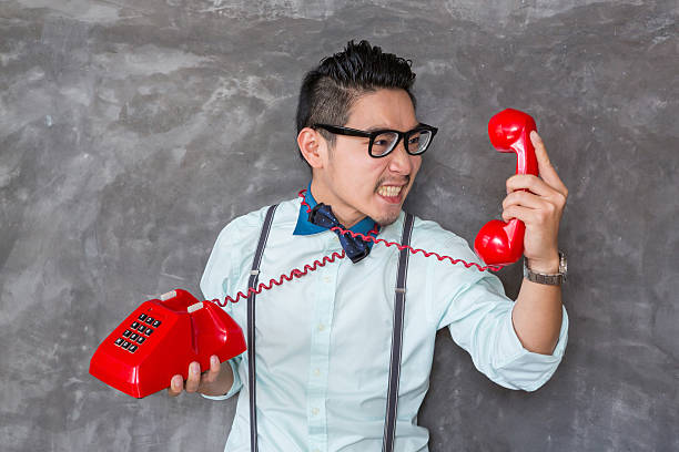istock Young man portrait with telephone 165494056
