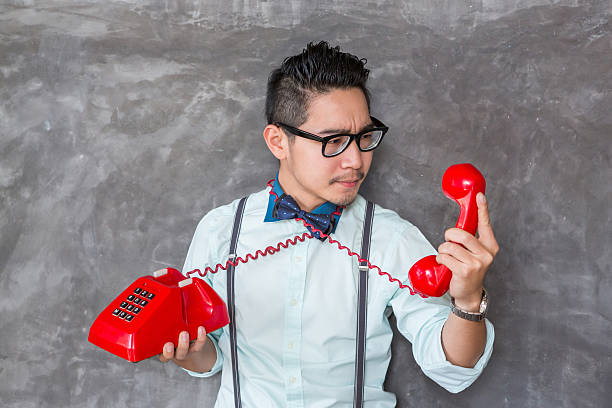 istock Young man portrait with telephone 165494061