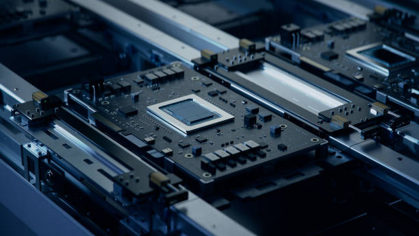 istock Close-up of a Black Circuit Board with Advanced Microchip on Assembly Line. Electronic Devices Production Industry. Fully Automated PCB Assembly Line. Electronics Manufacturing Facility or Factory 1654943651