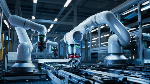 istock Close-up of High Precision Robot Arms on Automated PCB Assembly Line Inside Modern Electronics Factory. Component Installation. Board. Electronic Devices Production Industry. Manufacturing Automation 1654943972