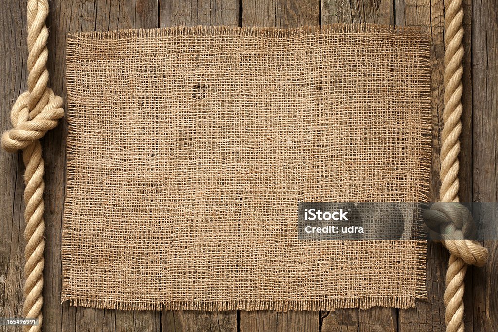 Old vintage rope and planks background with jute Old vintage rope and planks background abstract concept on jute Brown Stock Photo
