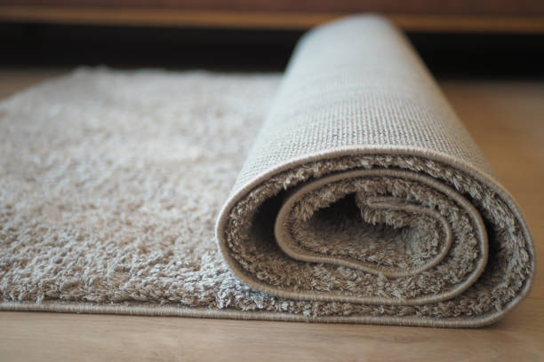istock carpet texture background on wooden floor with copy space 1654984200