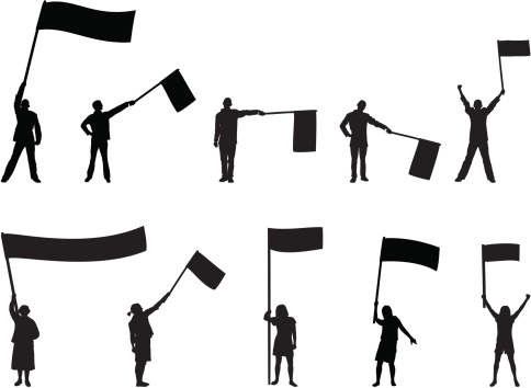 Ten people waving flags.
