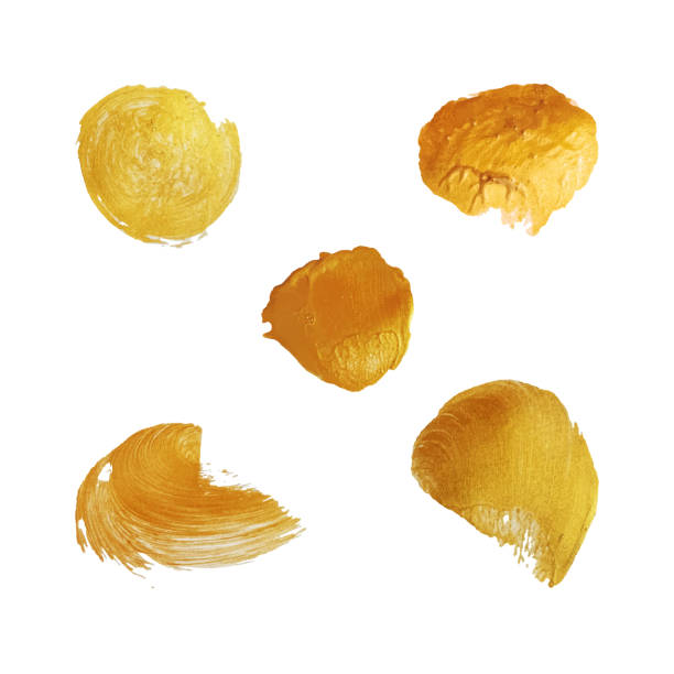 istock Set of golden spots, brush strokes. Bright design elements. Abstract vector drawing. 1655030798