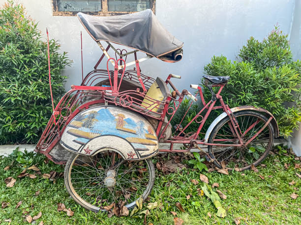 istock Javanese cycle rickshaw - Beautiful Indonesian Traditional Pedicab or called Becak Kayuh. This is a good tourism transportation in Yogyakarta City, Indonesia. Concept for vintage classic retro vehicle, and vacation. 1655031208