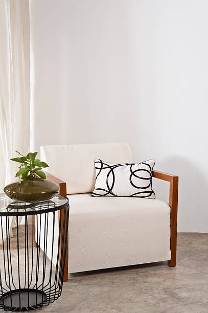 istock Bright white armchair in a living room 165504312
