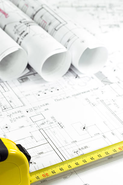 istock Blueprints and tape measure 165504558