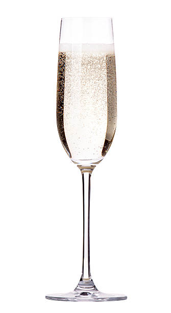 Single glass of sparkling champagne in a flute  stock photo