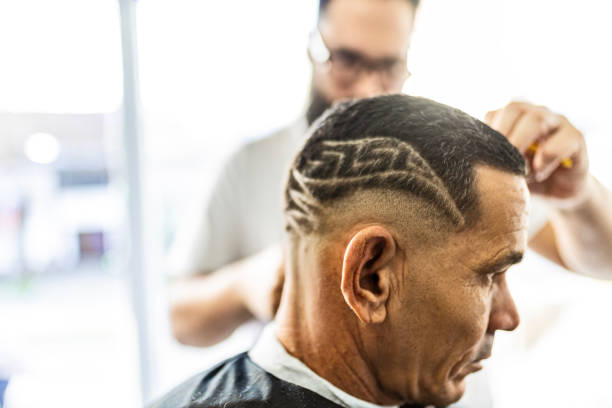 istock Barber Crafting Styles with Finesse 1655086629