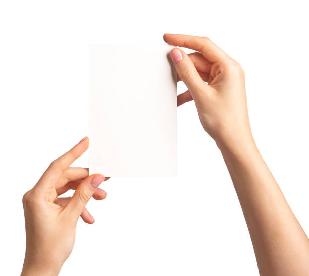 istock Hands holding greeting card mockup, blank postcard isolated on white background 1655090317