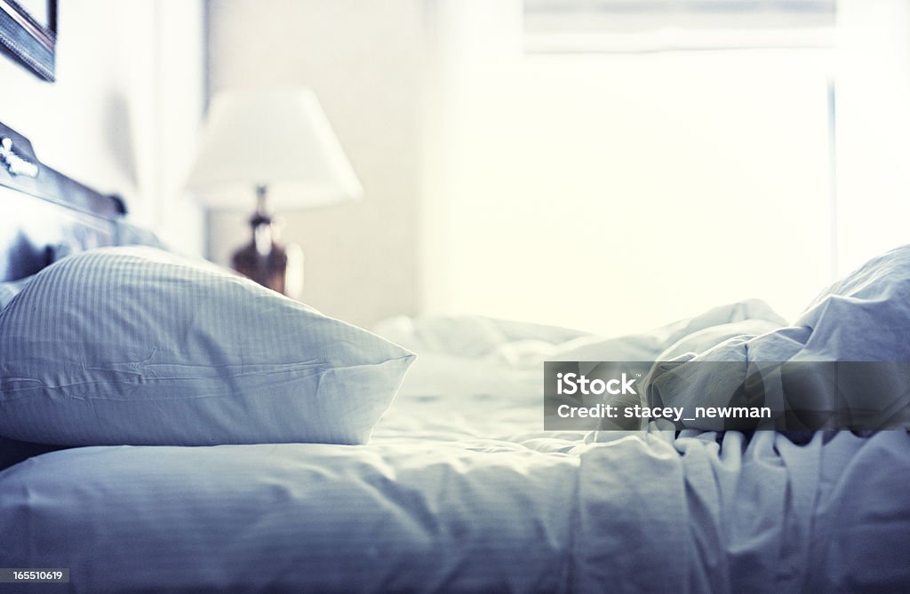 Hotel Bed, White Sheets, Morning After Bed - Furniture Stock Photo