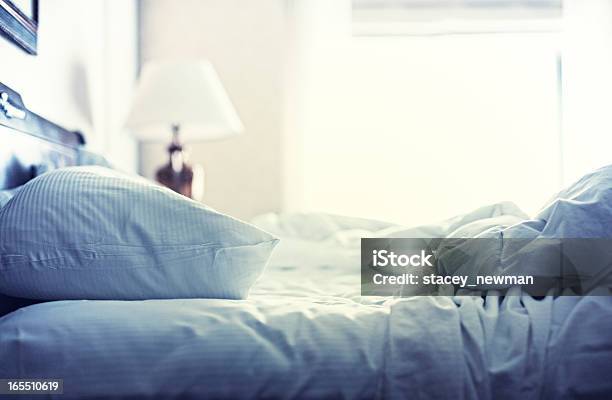 Hotel Bed White Sheets Morning After Stock Photo - Download Image Now - Bed - Furniture, Messy, Pillow