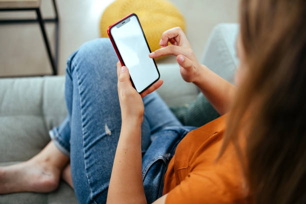 Woman is using a mobile phone