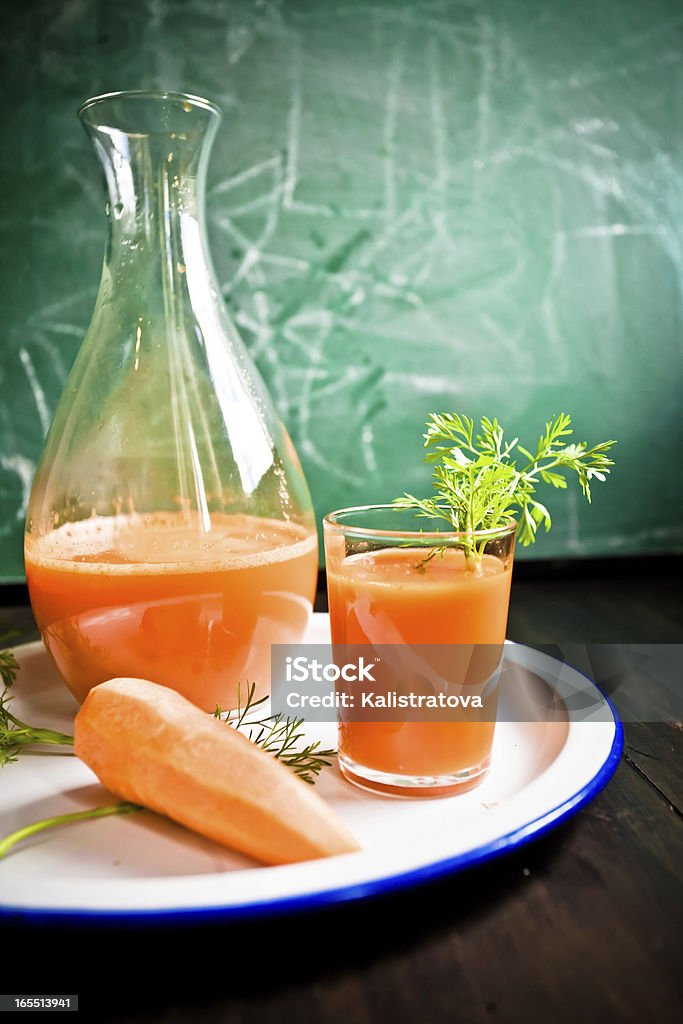 Succo di carota - Foto stock royalty-free di Succo di carota