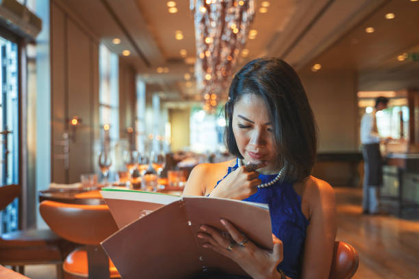 istock Ordering food from menu at Luxury restaurant, fine dining 1655143857