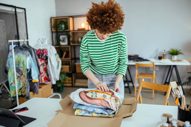 istock Woman prepares a package for delivery 1655148151