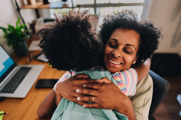 istock Mother embracing her daughter that arrived at home 1655167999