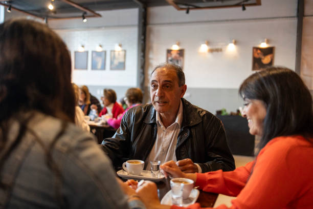 istock Happy intergenerational family in a coffee shop 1655232549