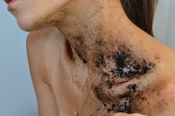 istock the girl smeared coffee scrub on her body 1655293074