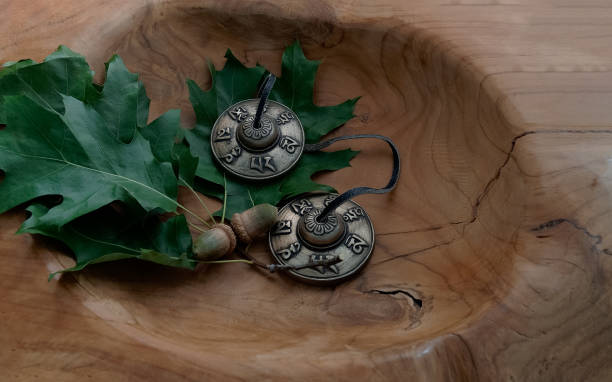 istock Relaxation time with Tibetan dishes. Tingshas 1655350387