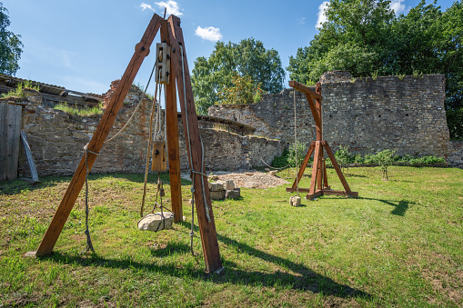 Cesis, Latvia - Jul 21, 2019: Stone-lifting devices at Cesis Castle Medieval Activity Area - Cesis, Latvia