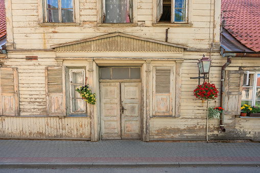 Wooden House Facade with flowers - Cesis, Latvia
