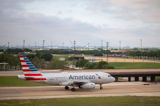 American Airlines Airbus A319-132 aircraft with registration N804AW taxiing at Dallas/Fort Worth International Airport in April 2022