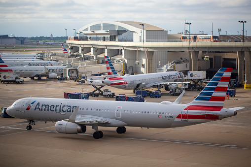 American Airlines Airbus A321-231 aircraft with registration N150NN taxiing from gate at Dallas/Fort Worth International Airport in April 2022