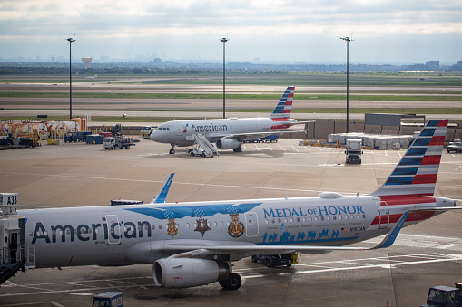 American Airlines Airbus A321-231 aircraft with registration N167AN with Flagship Valor livery parked at Dallas/Fort Worth International Airport in April 2022