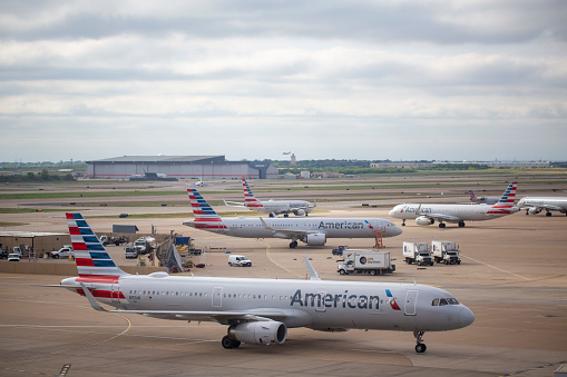 New York, March 16, 2017: An American Airlines jet late in the day at gate 14 Terminal 8 at JFK.