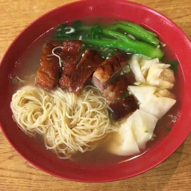 wonton noodles soup with roasted duck and chinese broccoli