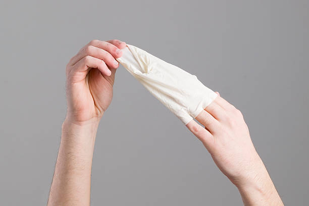 istock Two hands and latex glove 165568880
