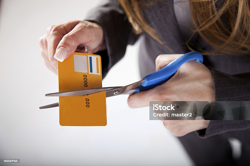 Corte feminino sobre o cartão de crédito. - Foto de stock de Atividade comercial royalty-free