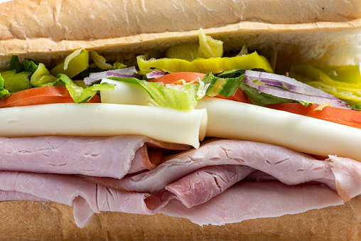 Sliced ham, Cheese, lettuce and tomato submarine sandwich
