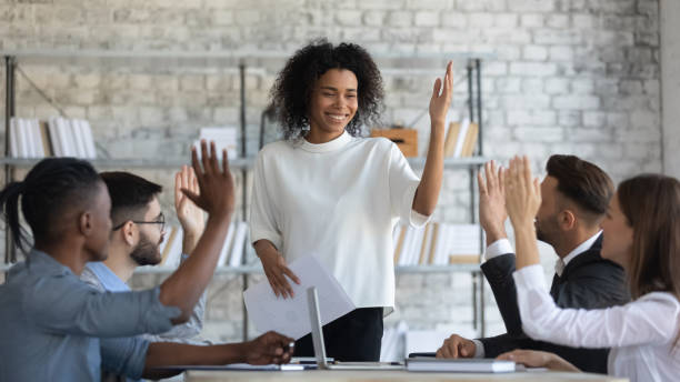 istock Multiracial businesspeople engaged in teambuilding training at meeting 1655755434