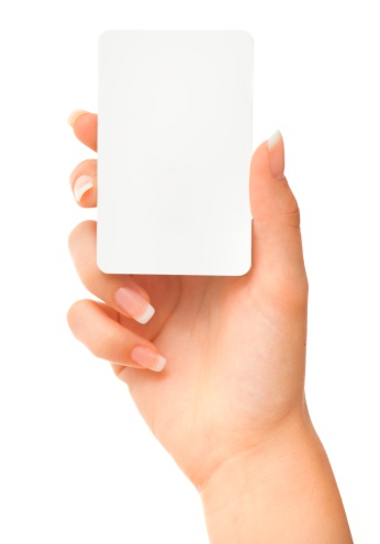 Blank play card in woman hand on white