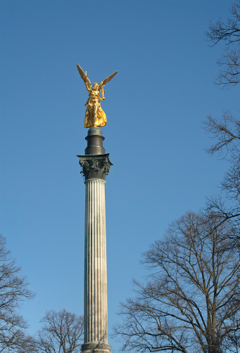 The iconic golden Friedensengel (Angel of Peace) statue in central Munich, Germany with space for copy.