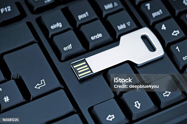 Metal Usb Flash Storage Key On Black Keyboard Stock Photo - Download Image Now - Security, Security System, Key