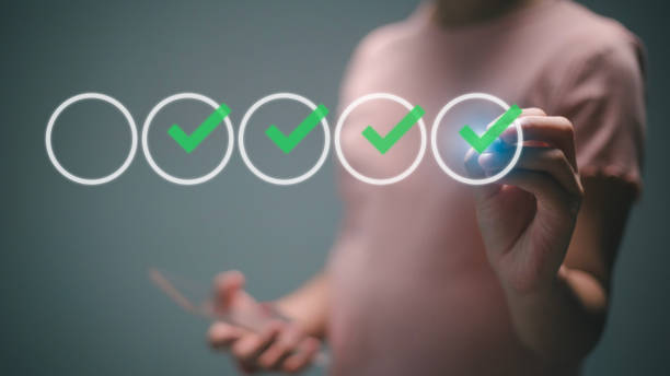 istock Businessmen evaluate with checkboxes online on a virtual screen. assessment survey online, choosing the correct answer in test, questions test, online exam, quiz knowledge, filling out a survey form. 1655858041