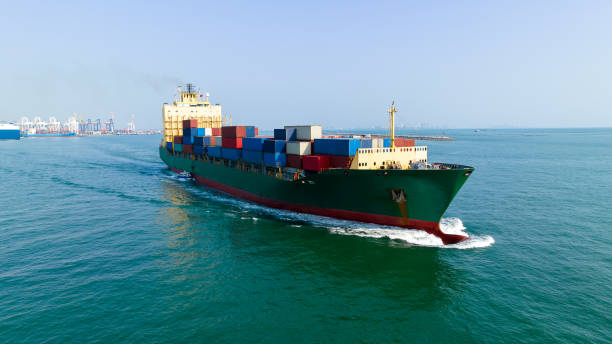 istock container cargo ship import export global business and industry commercial trade logistic and transportation of international by container cargo ship in the open sea, Container cargo freight shipping, front view drone shot, 1655952668