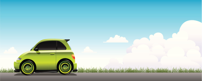 Vector illustration of a small green car on a gray road
