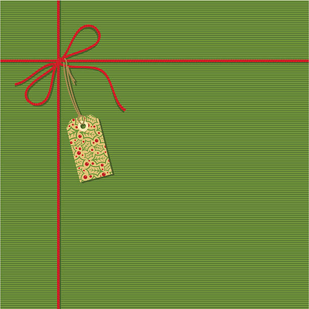 Christmas present Present with a holly label. Please see some similar pictures in my lightboxs: gift wrap and ribbons stock illustrations