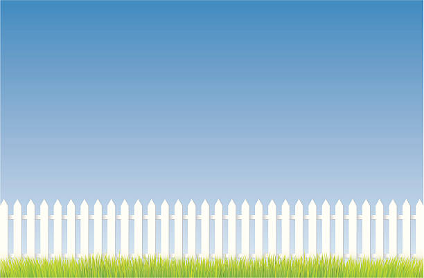 White fence White fence with grass and blue sky/copy space. picket fence stock illustrations