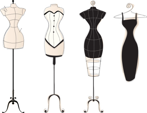Three vintage-style dress forms and a little black dress on a hanger.