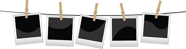 Photos with clothespin Photos with clothespin on white. Illustrator vector image. clothespin photos stock illustrations