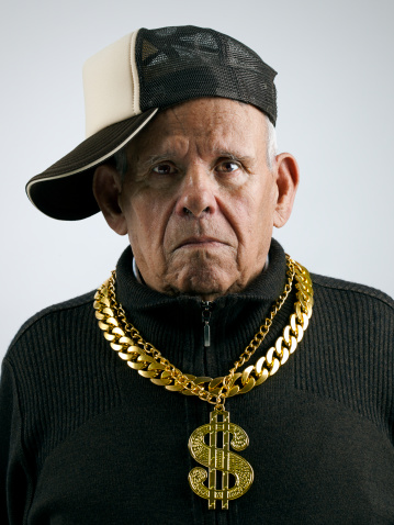 grandfather with a cap and golden chains