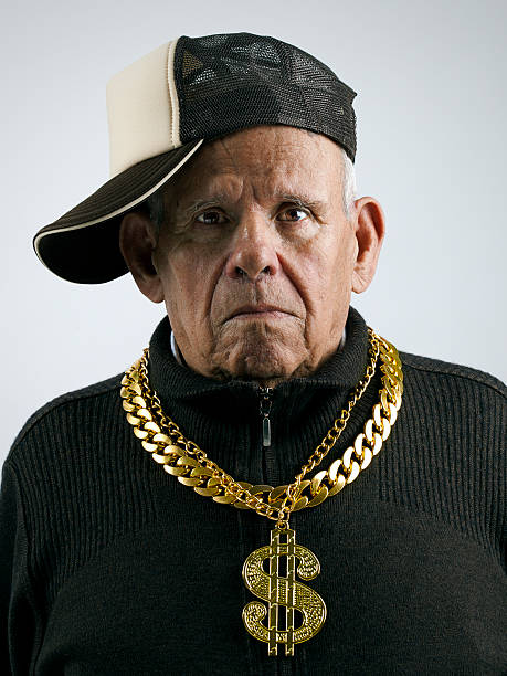 Old School grandfather with a cap and golden chains rap stock pictures, royalty-free photos & images